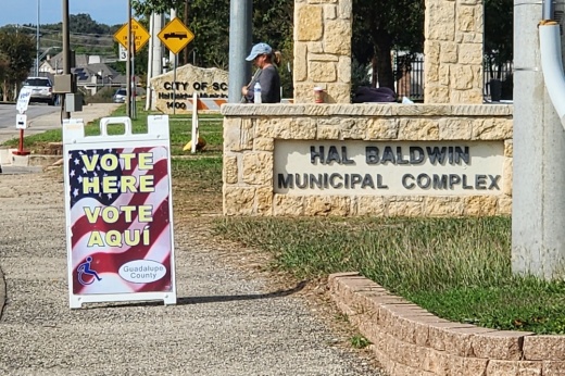 Voting signs in front of the Schertz Community Center.