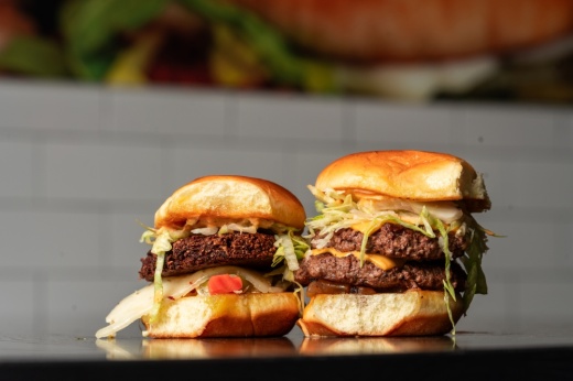 two burger sliders on a table
