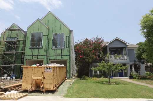 This new large home was being built next to a smaller historic home in the Lakewood area of Dallas earlier this year. (Community Impact staff)