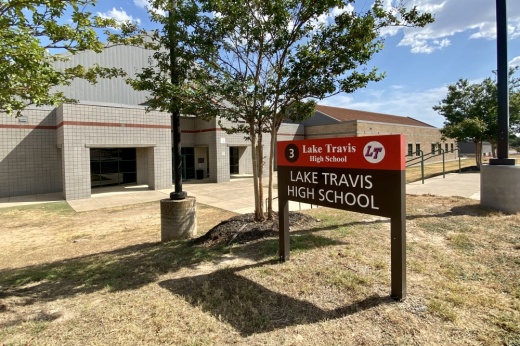 A sign reads "Lake Travis High School