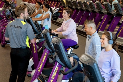 People working out in a Planet Fitness location