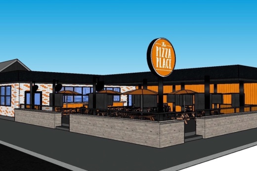 a rendering of a restaurant with a large sign and patio