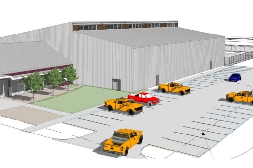 a rendering of a large aircraft hanger building and parking lot