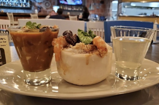 The menu offers Hispanic-style seafood options ranging from fried calamari to ceviche de camaron. (Courtesy of Palapas Seafood Bar)