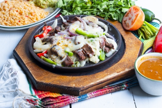 Beef fajita with rice and charros beans on the side