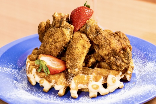 Chicken and waffles with strawberries