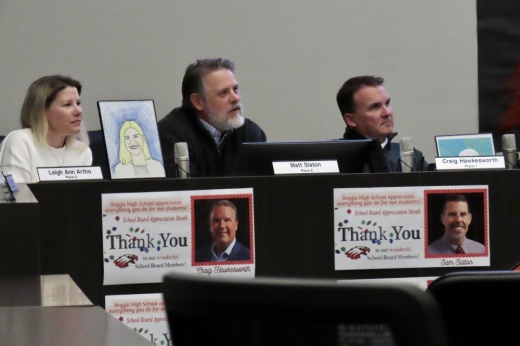 Board members at meeting