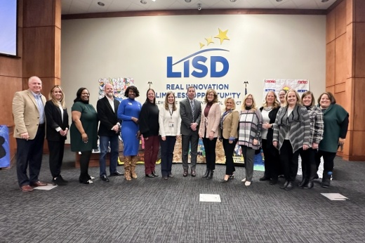 Scott Wrehe posed with district officials