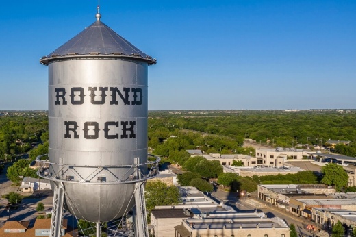 A Round Rock water tower depicted in the downtown area.