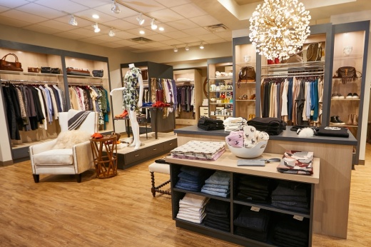 A look inside the boutique shows clothing and accessories on display.