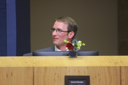 Council member Ryan Alter sits at dais during a meeting of the Austin City Council