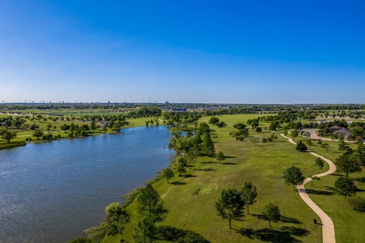 A small lake or pond is shown in the center of Old Settlers Park in Round Rock