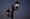 A lamp post lights as dusk settles in a Pflugerville neighborhood. 