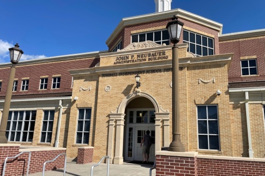 The photo shows TISD's administration building.