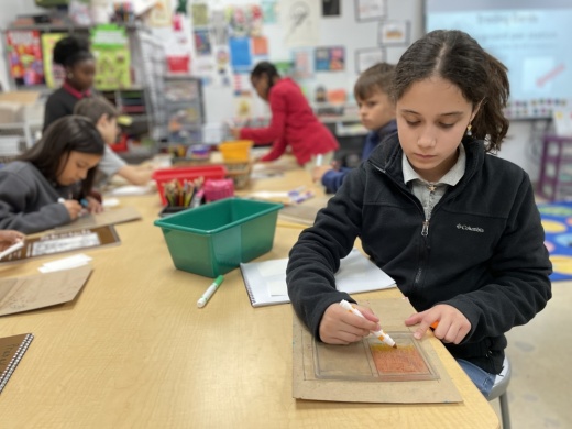 Students color at Meridian World School, one of many alternative education options in Round Rock. (Courtesy Meridian World School)
