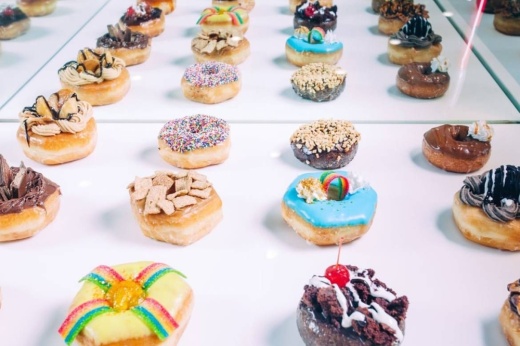 Rows of a various donuts