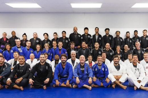 Jiu Jitsu team posed at gym.