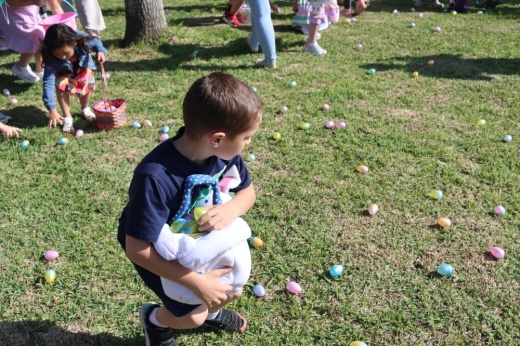 Child hunting Easter eggs.