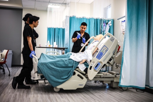 students practicing with a simulation