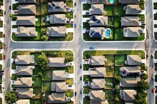 A view of homes from the sky.