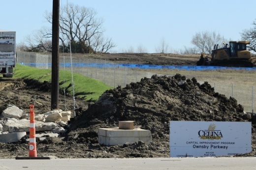 ownsby parkway pile of dirt and construction sign