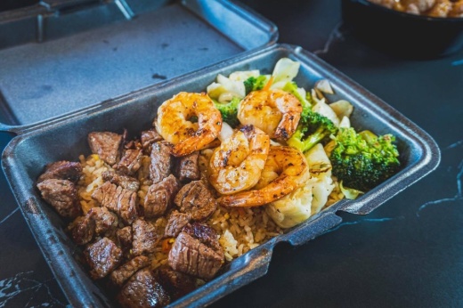 food from F&F Japanese Grill in a to go box