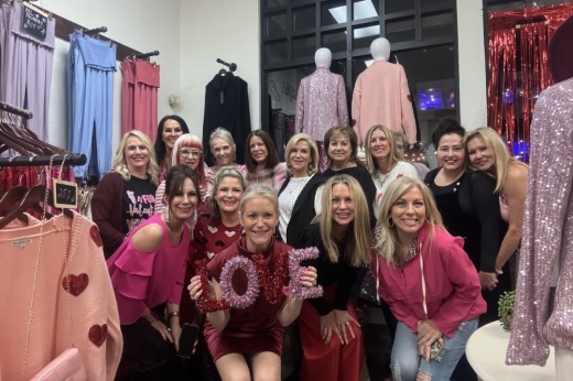 A gathering inside the Grapevine location of House of Mo Boutique