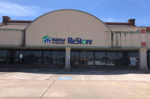 Building with Habitat for Humanity Collin County ReStore signage.