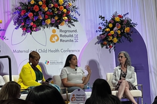 A photo of women on a health care panel.