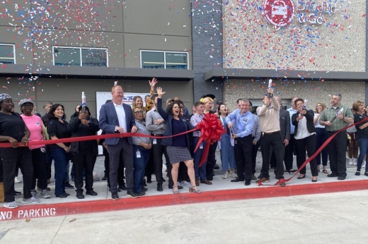 ribbon cutting of tom thumb in frisco