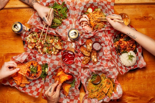 A birds eye view of a spread of food served at Yellow Ranger