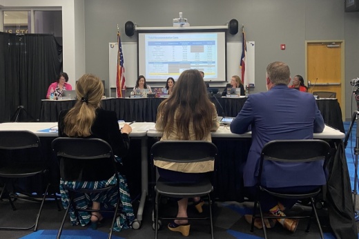 Officials present to the board of trustees