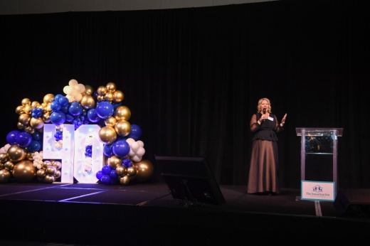 Chief Development Officer Kellie Maynard speaks during a program at Samaritan Inn's 40th Anniversary Gala on April 20 at Omni PGA Resort in Frisco. (Courtesy Azure Photography)
