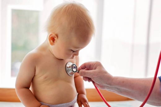 Baby getting a check up. (Courtesy Adobe Stock)