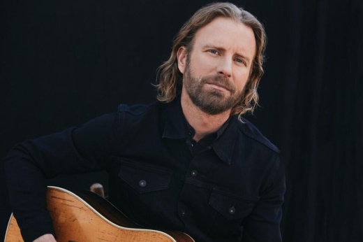 A musician with a guitar