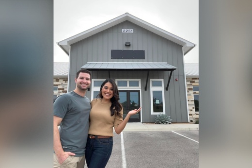 Dr. Desiree Chapa with her husband Eric in front of Cibolo Valley Vision.