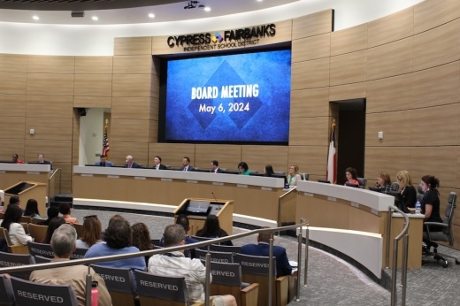 Crowded board room May 6