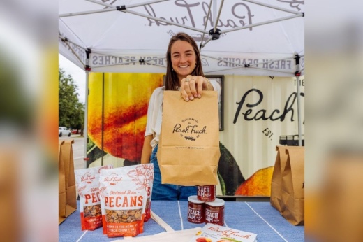 This touring peach truck stops in Pearland this summer to deliver boxes of hand-selected, juicy peaches. (Courtesy The Peach Truck)