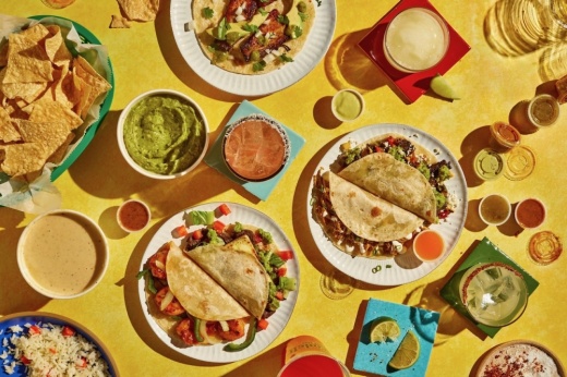 A photo of menu items at Tacodeli.
