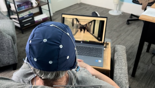 Cap on clients head during neurofeedback procedure