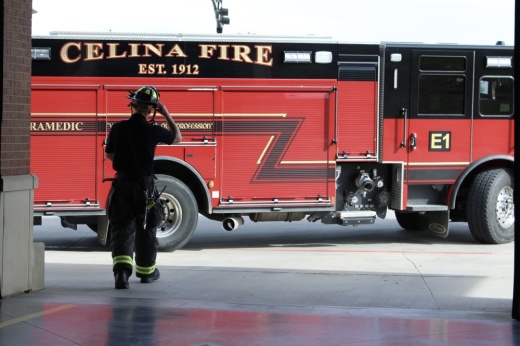 paramedic brock bollier walking toward a fire truck in celina