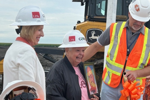 Gloria Martinez (center) said naming the school for her husband, who died in April 2021, was a large blessing to her and her family. (Brooke Sjoberg/Community Impact)