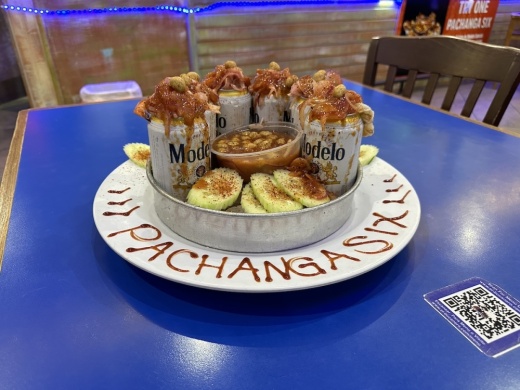 Six Modelo beers.