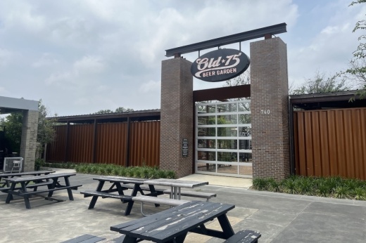 Picnic tables outside the entrance to Old 75 Beer Garden, which will be converted into a Truck Yard.