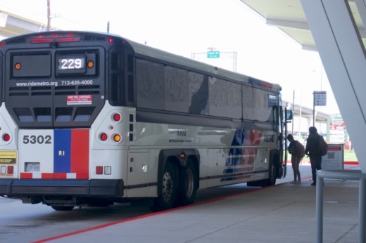 people get on a METRO bus