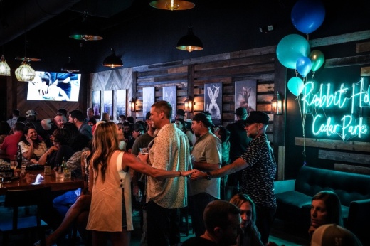 People dancing, socializing in Rabbit Hole Cedar Park