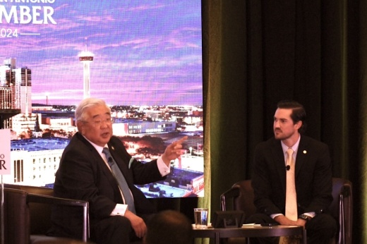 Bexar County Judge Peter Sakai (left) talks with North San Antonio Chamber of Commerce President and CEO Brett Finley during the chamber's June 12 State of Business luncheon at Grand Hyatt San Antonio. (Edmond Ortiz/Community Impact)