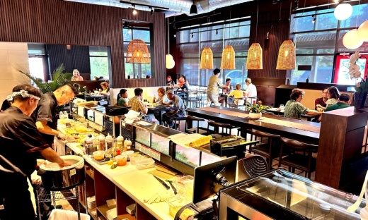chefs working in kitchen, people at tables