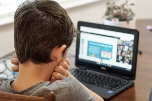 a child in front of a laptop