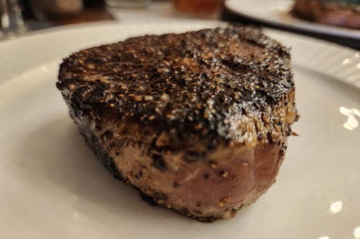 a cooked steak on a plate